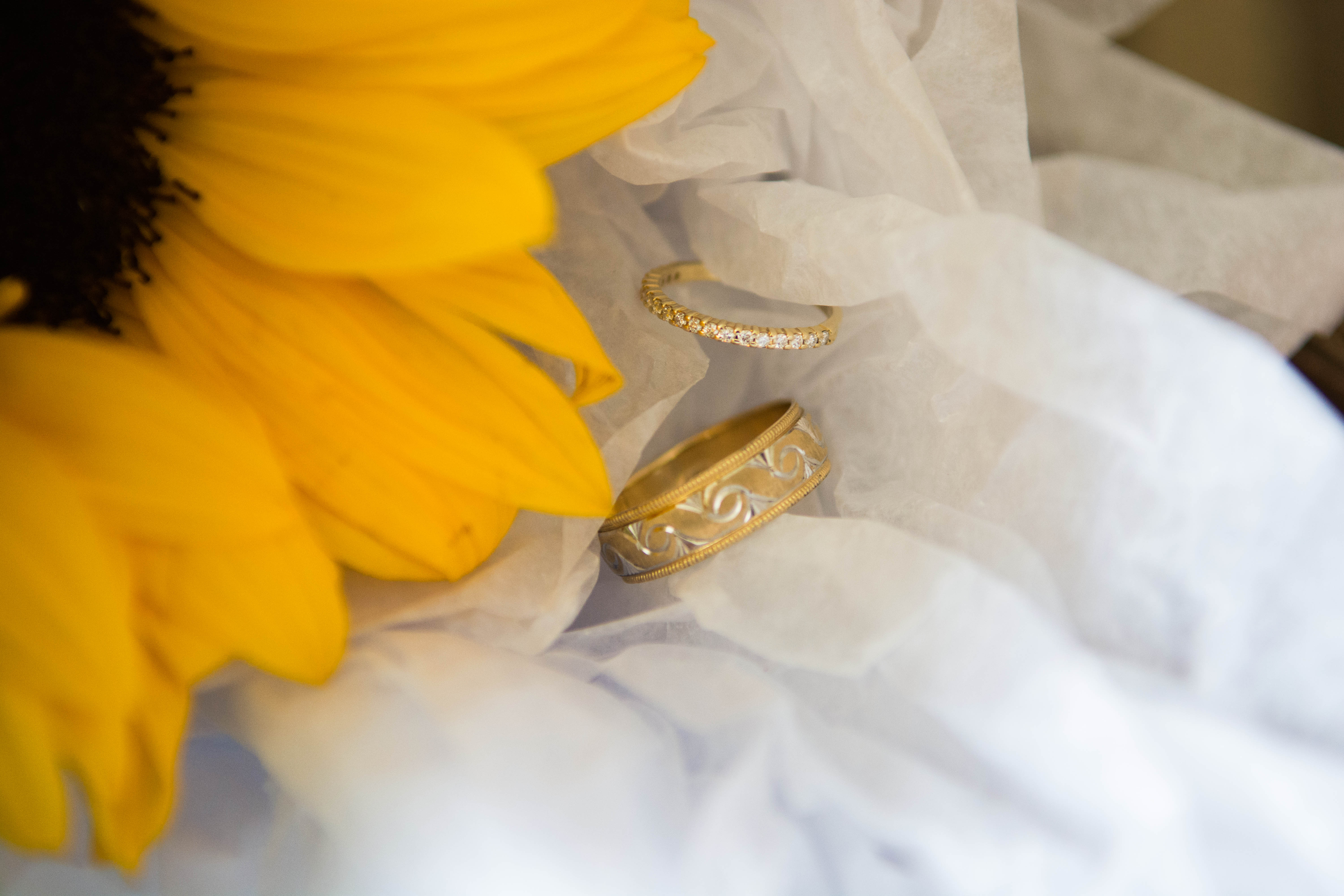 Wedding rings with sunflower detail