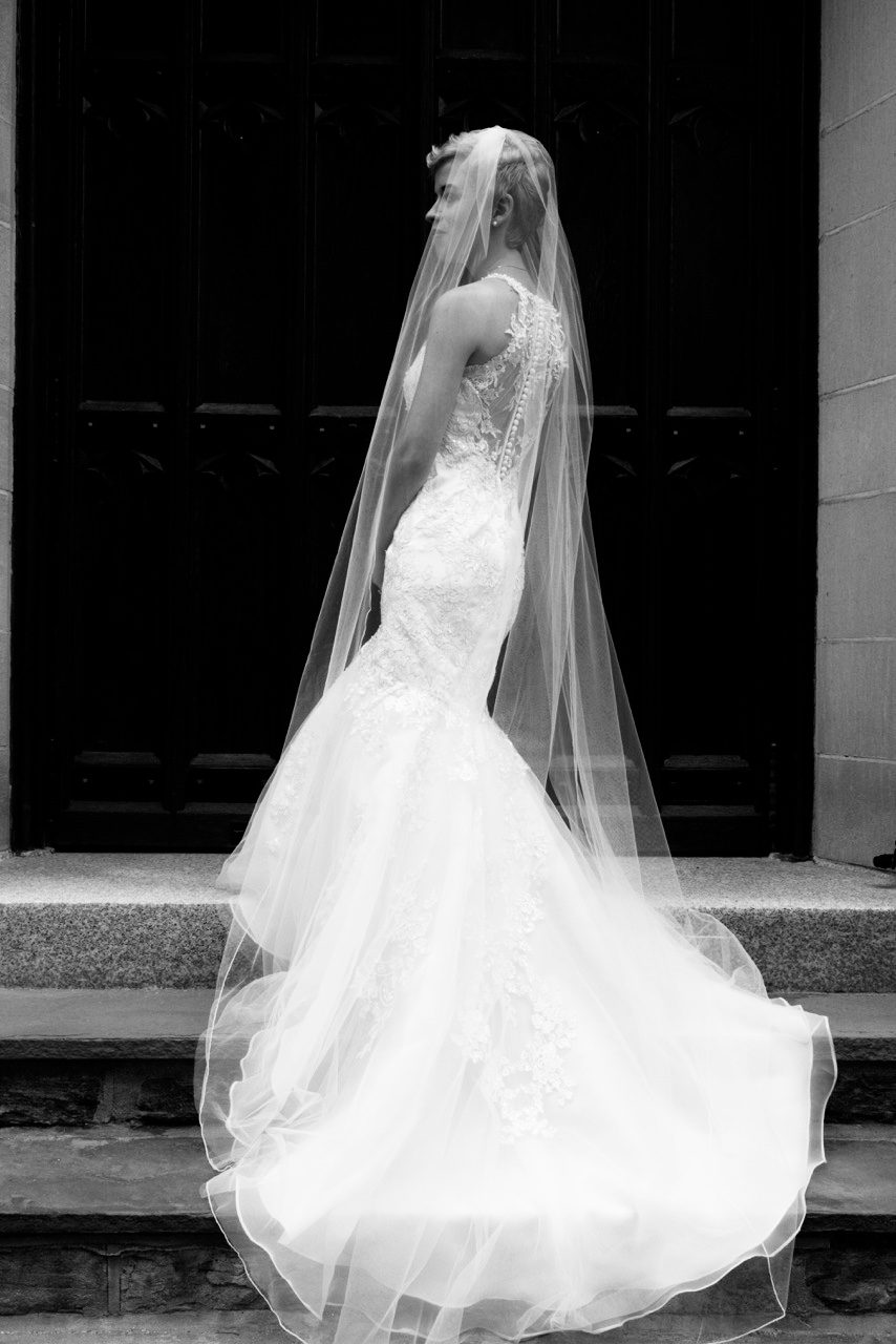 Bride in cathedral veil, black and white portrait
