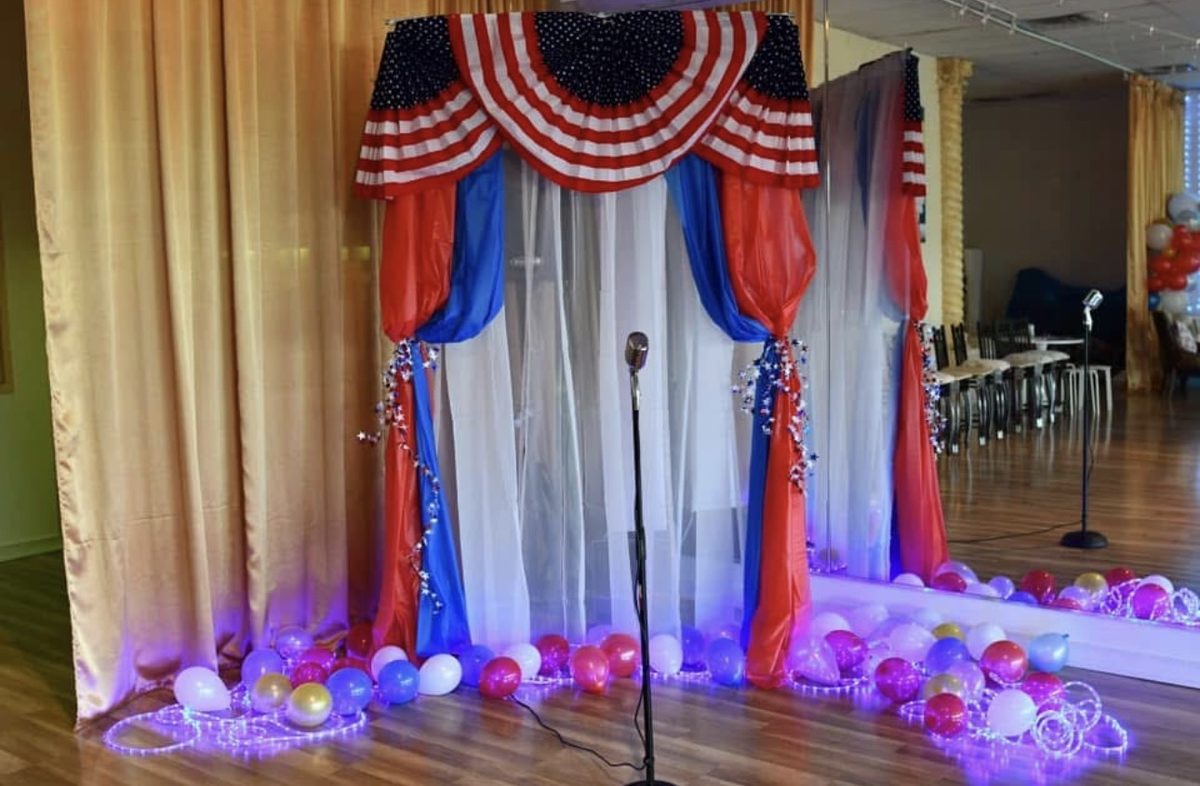 Stage and entertainment setup at a milestone party