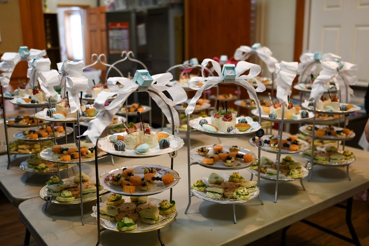 Tiered afternoon tea stands at a women's club event